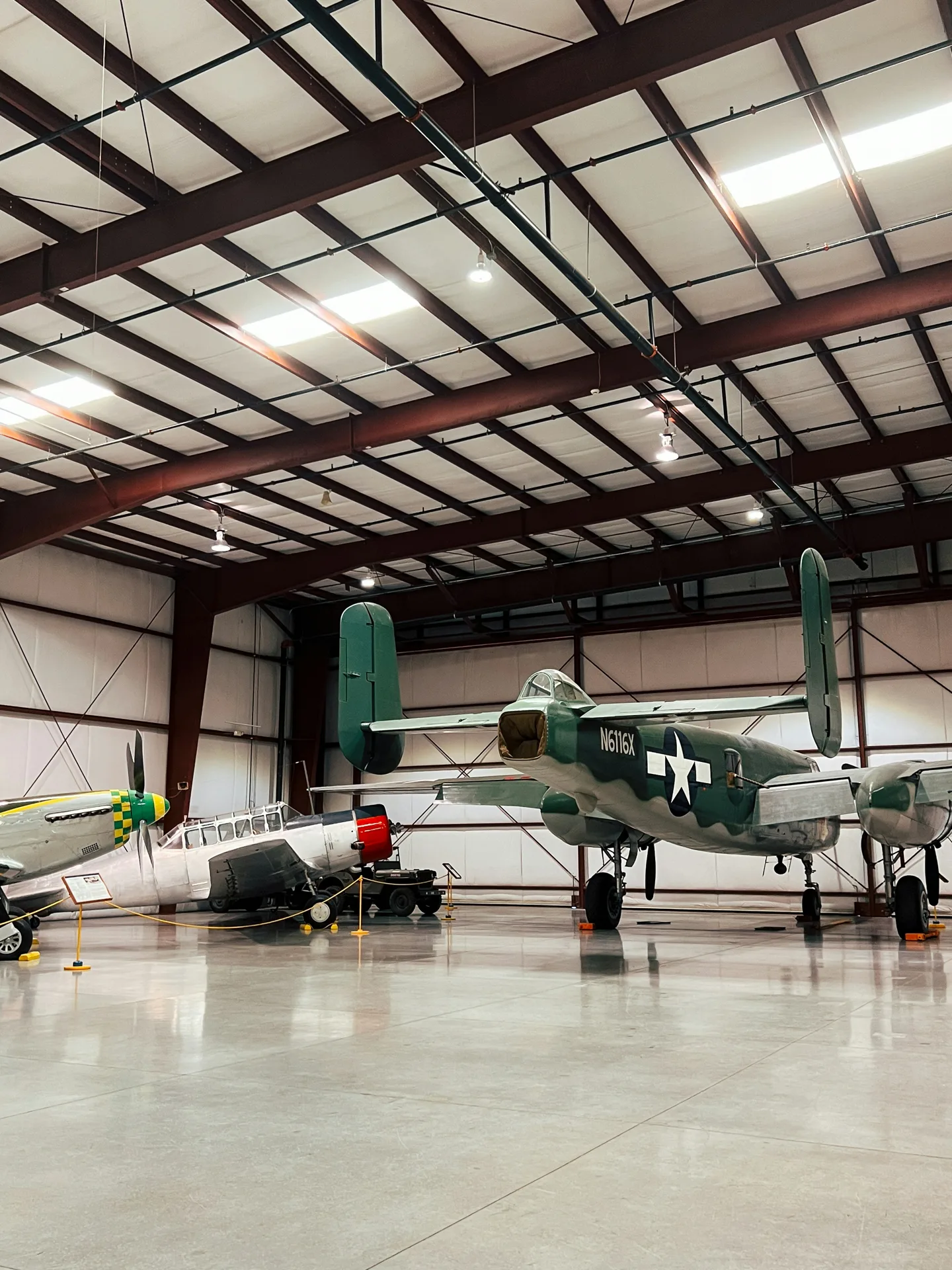 high-gloss concrete hangar floor with a vintage aircraft in Oshawa