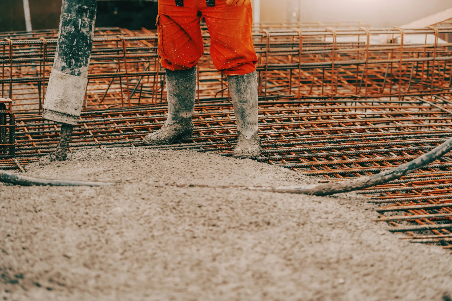 concrete pump operator placing concrete with a coiled hose in Oshawa