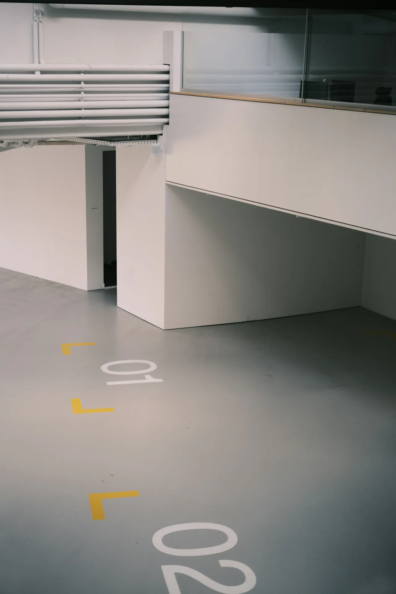 coated warehouse floor with line marking in a Oshawa facility
