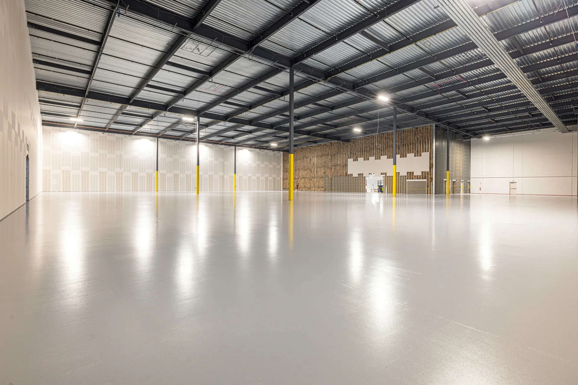 finished grey epoxy warehouse floor in a Oshawa distribution centre