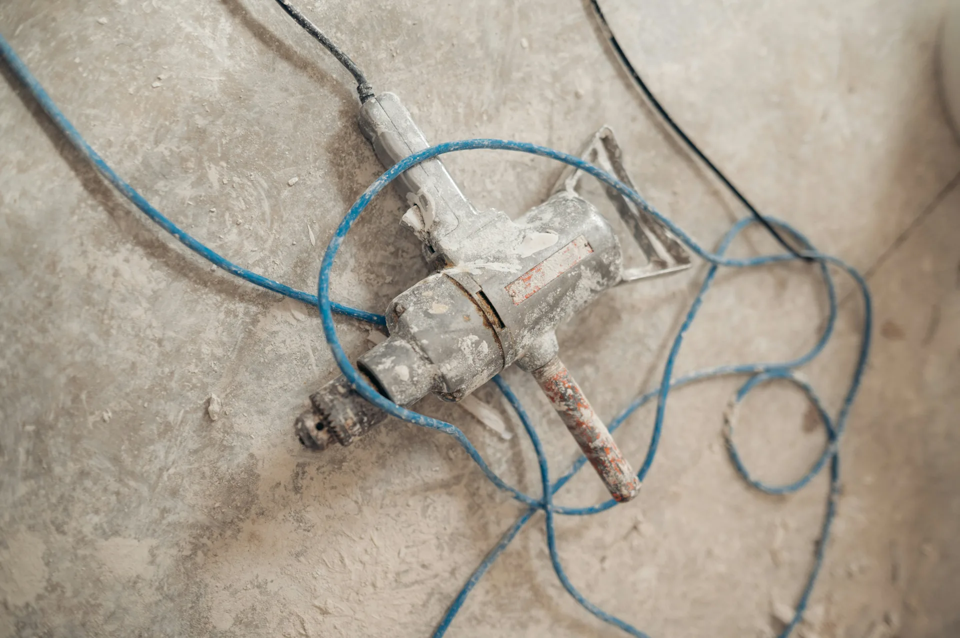 jackhammer removing a failed section of concrete for repair in Oshawa