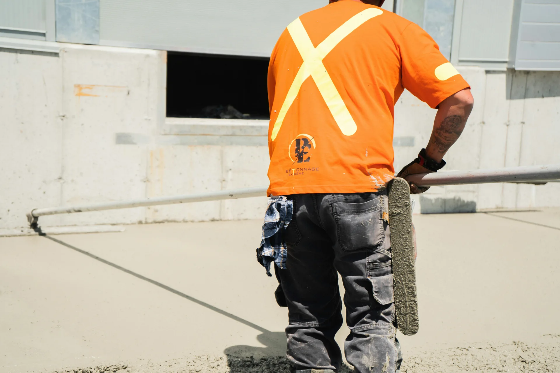 finisher working an Ardex application on a Oshawa floor
