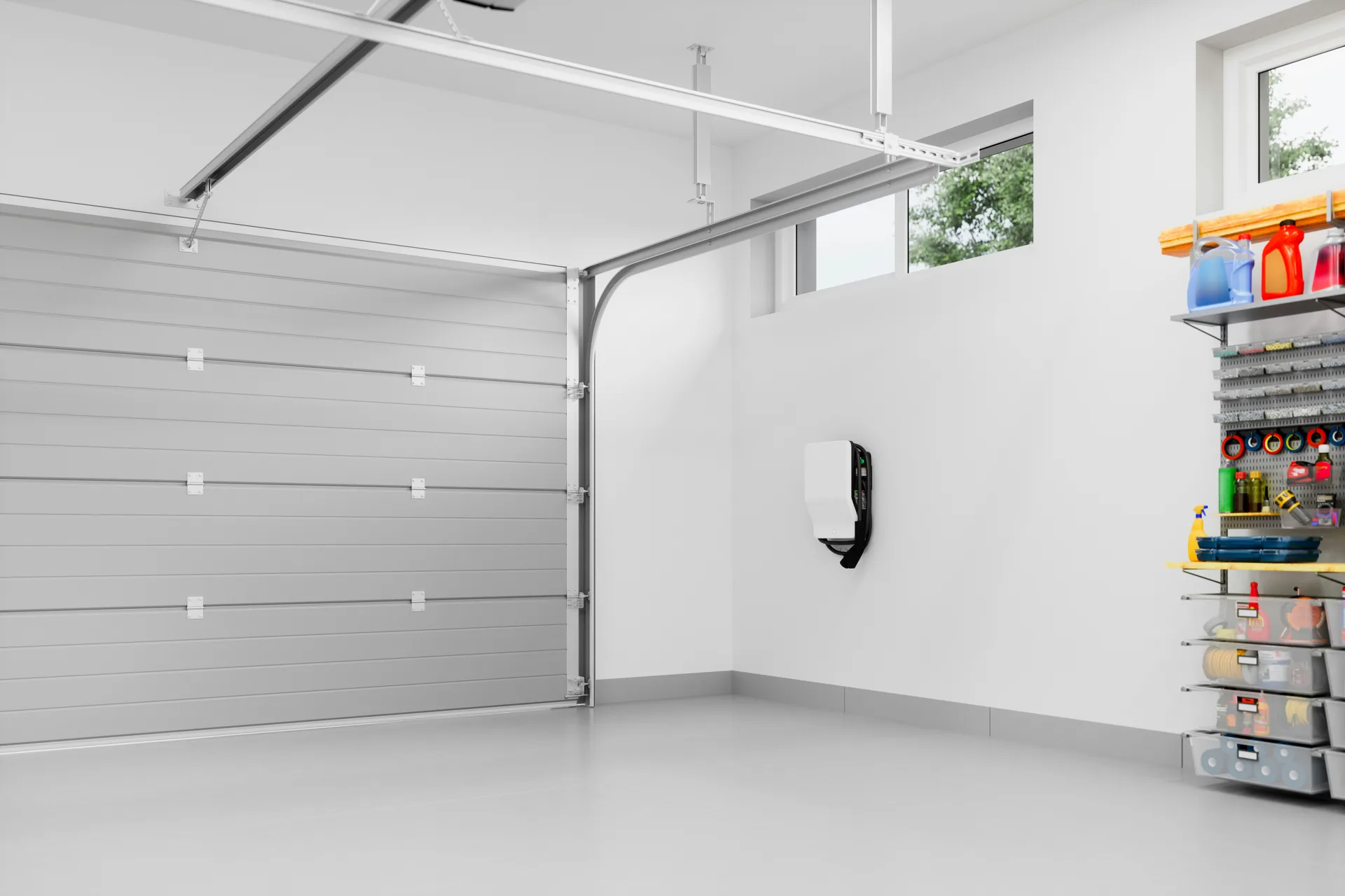 epoxy-coated garage floor with an EV charger at a Oshawa home