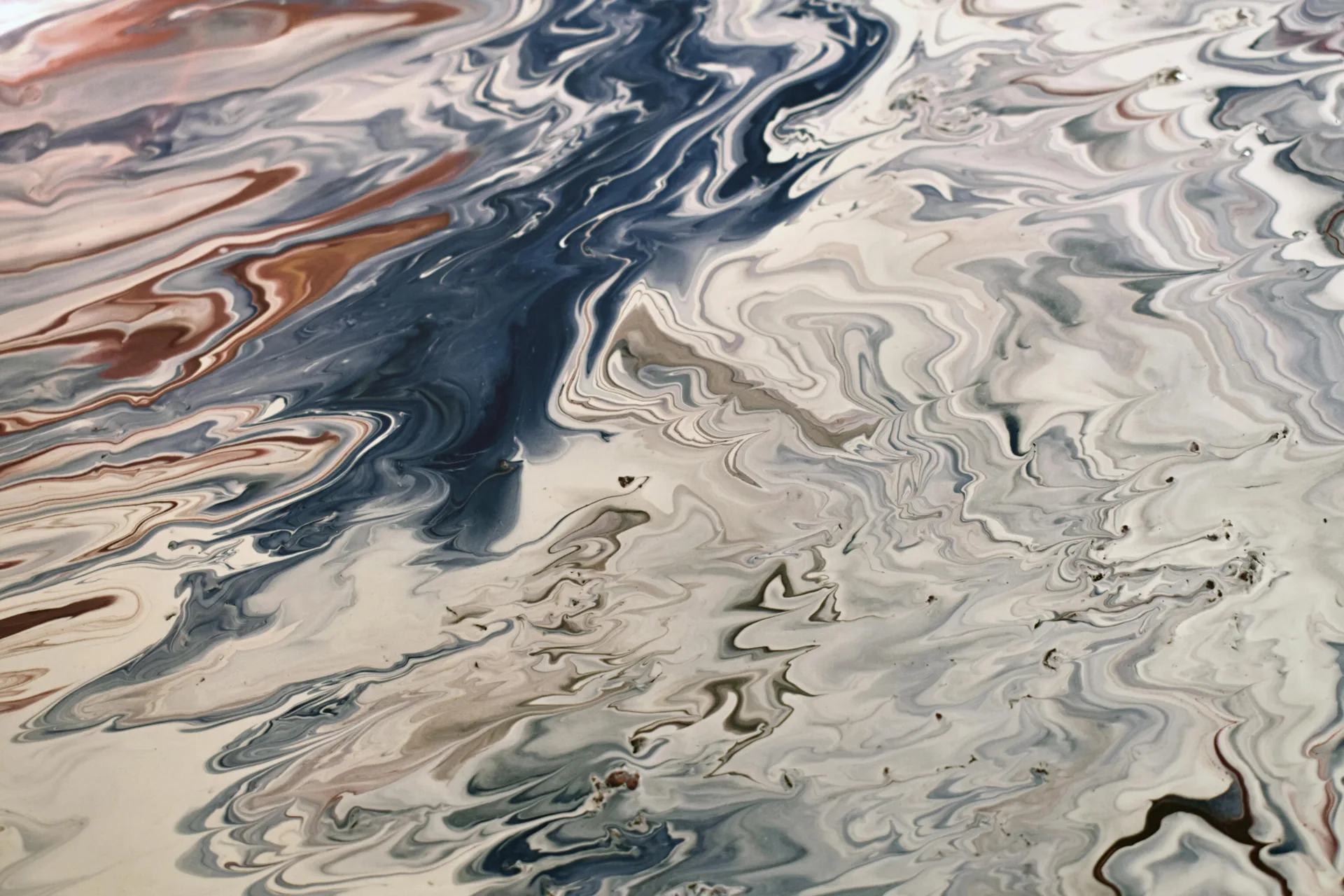 metallic epoxy garage floor with a swirl pattern in Oshawa