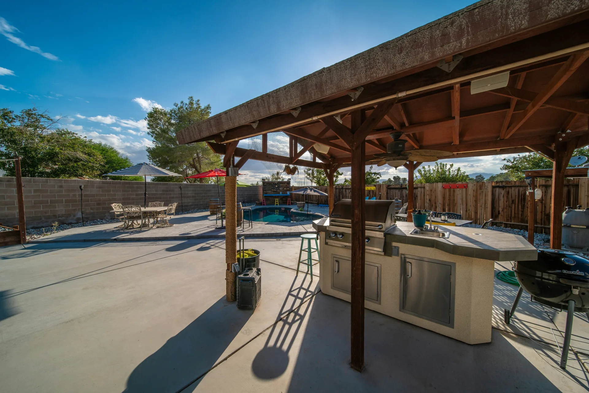 broom-finish concrete pad around a fire pit at a Oshawa home