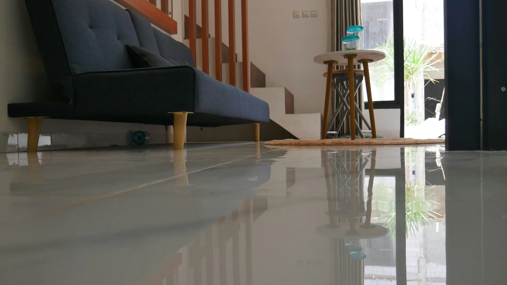 polished concrete floor reflecting light in a Oshawa living room