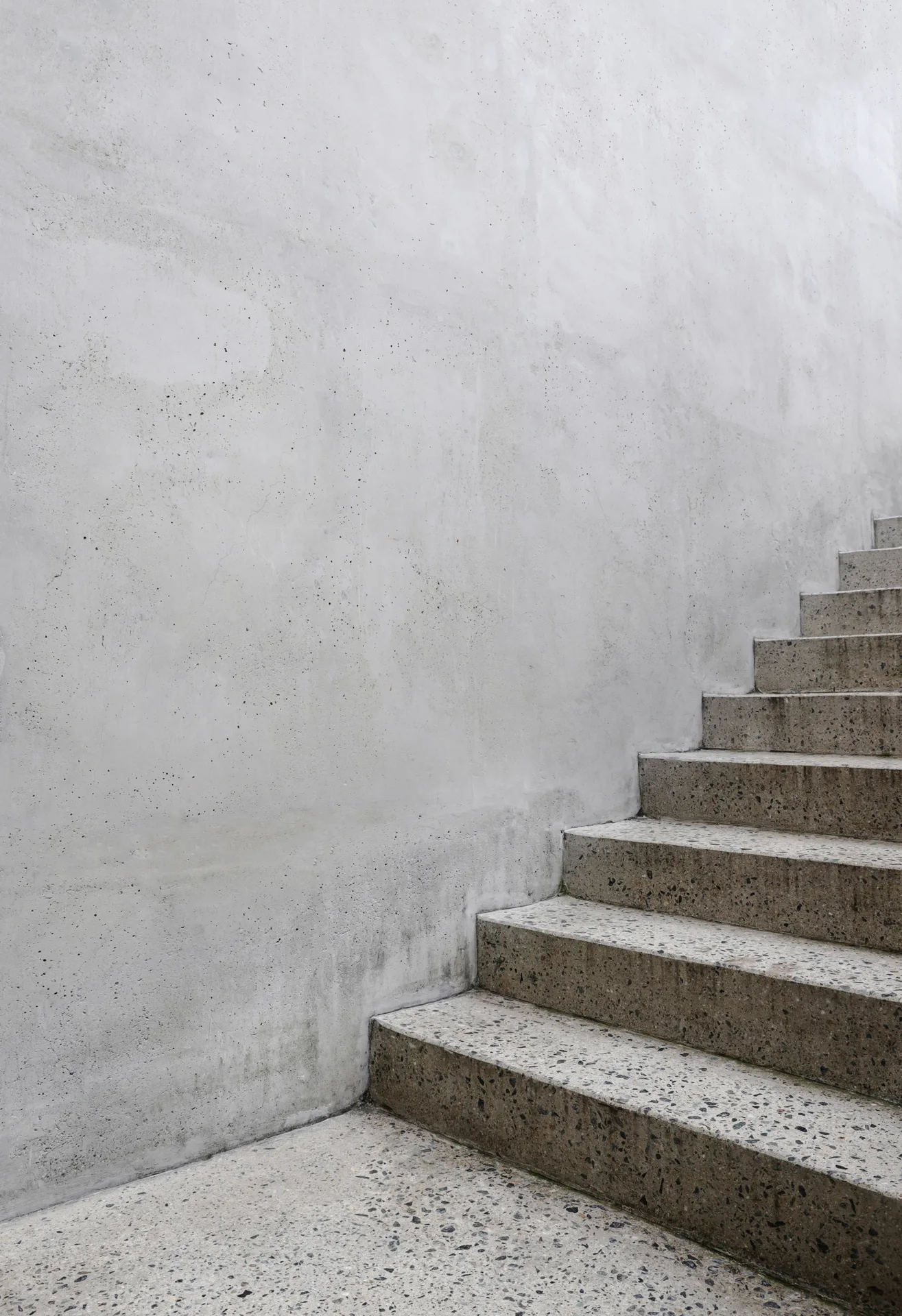 finished concrete front entry steps at a Oshawa home in winter