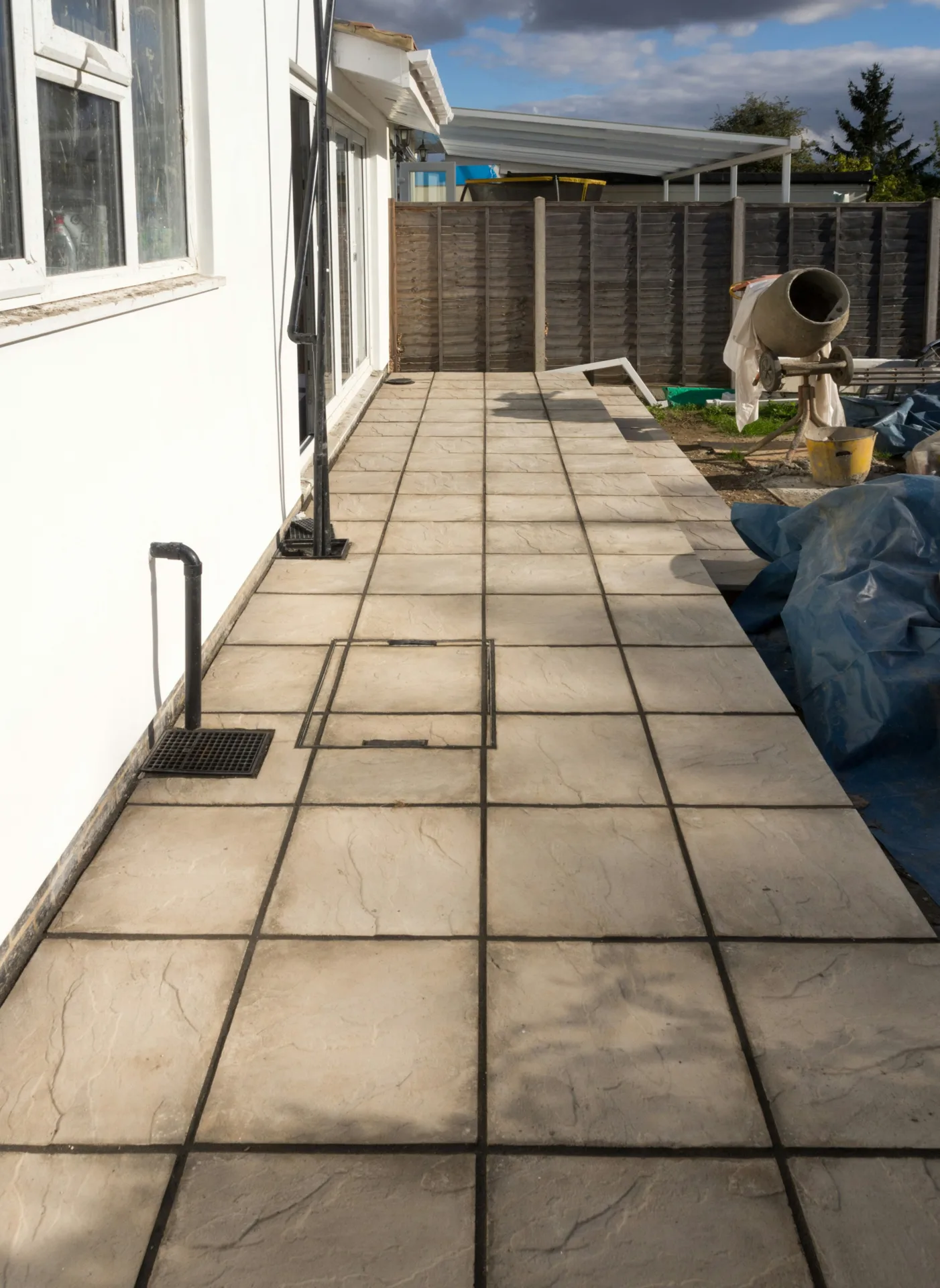 concrete walkway installation along the side yard of a Oshawa home